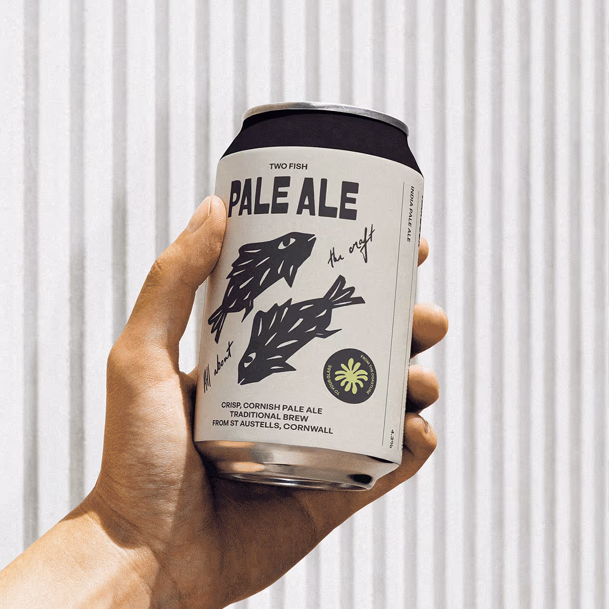 Hand holding a Harbour Pale Ale can